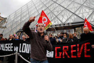 Striking workers block entry to Louvre Museum in Paris