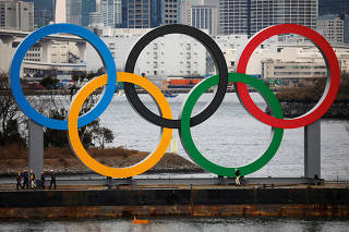 Giant Olympic Rings are installed at the waterfront area at Odaiba Marine Park in Tokyo, ahead of the Tokyo 2020 Summer Olympic Games
