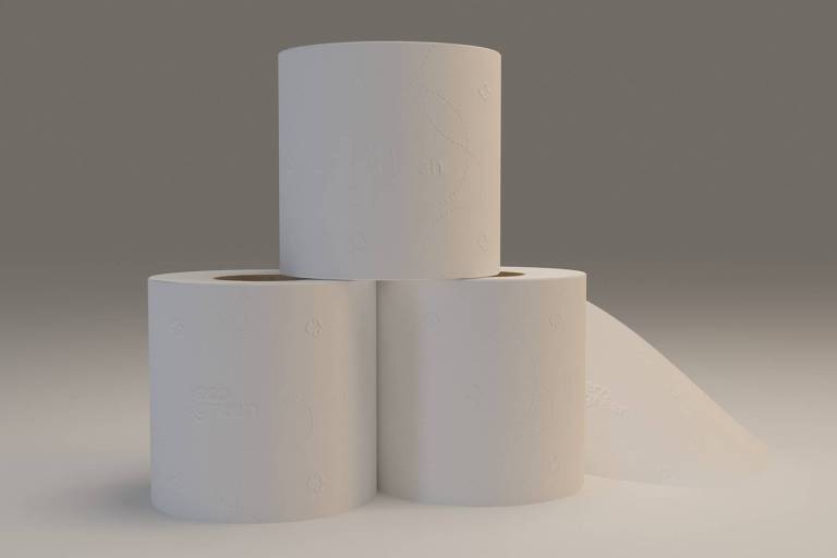 Três rolos de papel higiênico brancos dispostos dois embaixo e um sobre eles