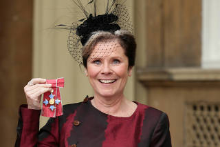 FILE PHOTO: Actress Imelda Staunton after receiving a CBE from the Duke of Cambridge for services to drama at an investiture ceremony at Buckingham Palace
