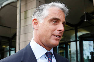 FILE PHOTO: UBS Chief Executive Andrea Orcel leaves after attending a UK parliamentary inquiry into Libor interest rates in London