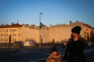Anti-eviction graffiti on buildings in the Prenzlauer Berg neighborhood of Berlin, Nov. 30, 2019. (Lena Mucha/The New York Times)