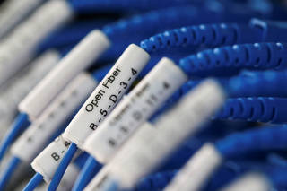 FILE PHOTO: Optical fiber cables for internet providers are seen running into a Enel Group server room in Perugia