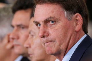 Brazil's President Jair Bolsonaro attends the ceremony marking his 400 days in office at the Planalto Palace in Brasilia