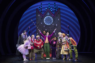 Christian Borle, center, as Willy Wonka in the musical 