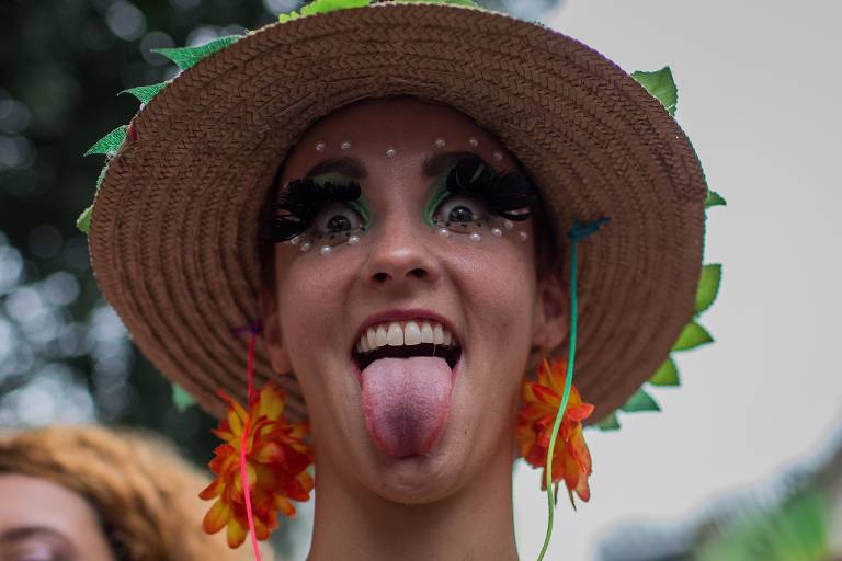  Foliões durante o bloco de carnaval Tupife, pelas ruas do centro do Rio de Janeiro