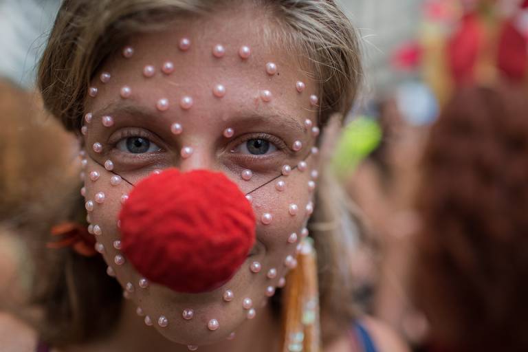  Foliões durante o bloco de carnaval Tupife, pelas ruas do centro do Rio de Janeiro