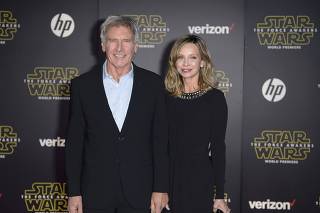 Actor Harrison Ford and his wife, actress Calista Flockhart, arrive at the premiere of 