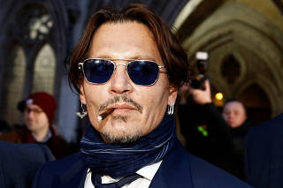 Actor Johnny Depp leaves the High Court in London