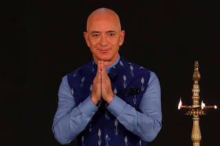 FILE PHOTO: Jeff Bezos, founder of Amazon, attends a company event in New Delhi