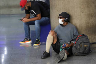 A man wears a protective face mask at a subway station after reports of the coronavirus in Sao Paulo