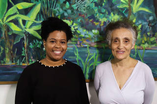 Jacqueline Goes de Jesus and Ester Cerdeira Sabino, Brazilian scientists working on the coronavirus DNA sequencing, pose at the Tropical Medicine Institute of the Sao Paulo University Medical School in Sao Paulo