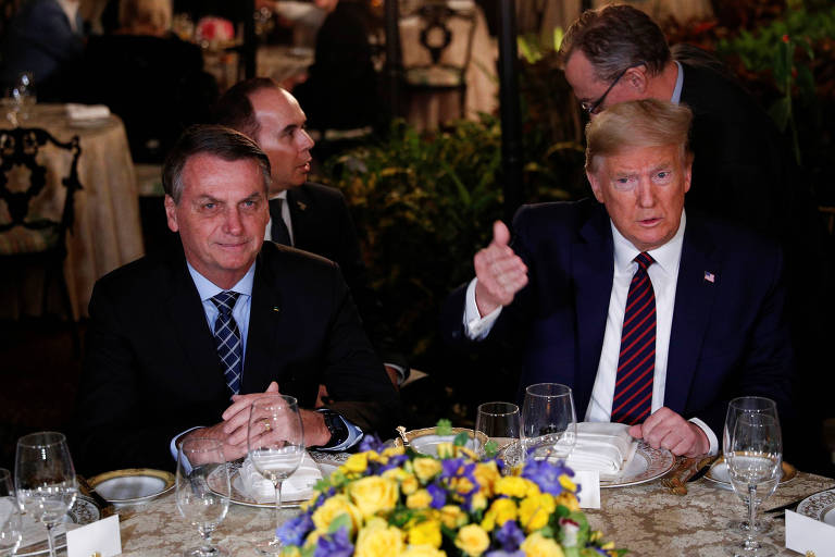 O americano Donald Trump recebe o presidente brasileiro, Jair Bolsonaro, em jantar na Flórida