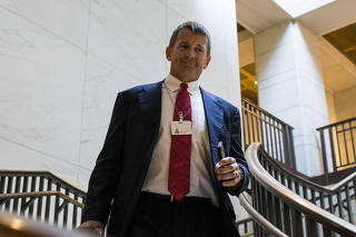 Erik Prince, the former head of Blackwater Worldwide and the brother of Education Secretary Betsy DeVos, heads to a House Intelligence Committee hearing on Capitol Hill in Washington, Nov. 30, 2017. (Zach Gibson/The New York Times)