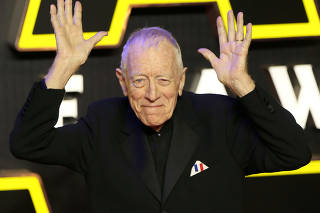 FILE PHOTO: Max von Sydow gestures as he arrives at the European Premiere of Star Wars, The Force Awakens in Leicester Square, London