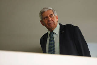 Brazil's Minister of Institutional Security Augusto Heleno looks on before an inauguration ceremony of the new Culture Secretary Regina Duarte (not pictured) at the Planalto Palace, in Brasilia