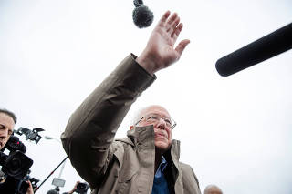 U.S. Democratic presidential candidate Bernie Sanders greets supporters outside of a polling station in Dearborn Heights, Michigan