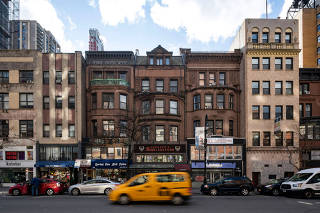 Apartments and storefront on West 72nd Street in New York on Dec. 15, 2019. (Katherine Marks/The New York Times)