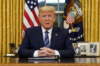 FILE PHOTO: U.S. President Trump speaks about the U.S response to the COVID-19 coronavirus pandemic during an address to the nation from the Oval Office of the White House in Washington