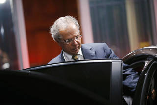 Brazil's Economy Minister Paulo Guedes leaves the Ministry of Economy building in Brasilia