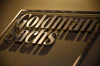 FILE PHOTO: A sign is displayed in the reception of the Sydney offices of Goldman Sachs in Australia