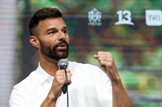 Puerto Rican singer Ricky Martin speaks at a news conference during the 61th International Song Festival in Vina del Mar