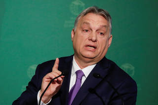 FILE PHOTO: Hungary's PM Orban takes part in an annual business conference in Budapest