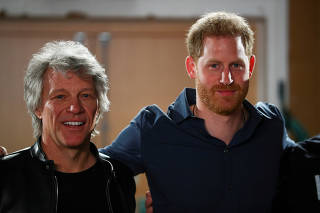 FILE PHOTO: Britain's Prince Harry meets Jon Bon Jovi at Abbey Road Studios in London