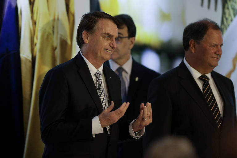 O presidente Jair Bolsonaro participa da posse do deputado federal Alceu Moreira como presidente da FPA (Frente Parlamentar da Agricultura), no Clube Naval em Brasília