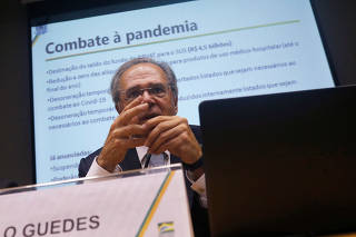 Brazil's Economy Minister Paulo Guedes speaks during a press conference to announce economic measures due the coronavirus outbreak in Brasilia