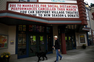 The Village Theatre marquee announcing cancellation of March performances due to the coronavirus disease (COVID-19) outbreak, photographed at the Francis J. Gaudette Theatre in Issaquah