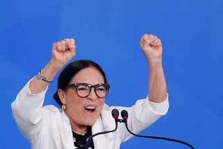 New Brazil's Culture Secretary Regina Duarte reacts during her inauguration ceremony at the Planalto Palace, in Brasilia