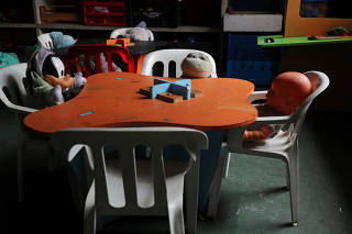 Toys are seen on children?s chairs at the empty library inside an abandoned building occupied by a homeless movement as the squatters keep a self-isolation following the coronavirus disease (COVID-19) outbreak in Sao Paulo
