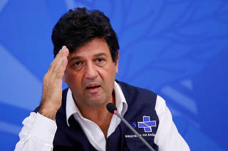 Brazil's Minister of Health Luiz Henrique Mandetta gestures during a news conference, amid the coronavirus disease (COVID-19) outbreak in Brasilia