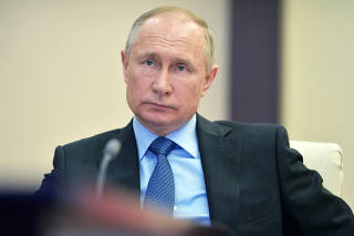 Russian President Vladimir Putin chairs a meeting of the Commission for military technical cooperation outside Moscow