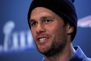 FILE PHOTO: New England Patriots quarterback Tom Brady speaks at a press conference ahead of Super Bowl LIII in Atlanta