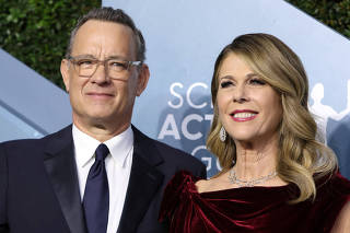 FILE PHOTO: 26th Screen Actors Guild Awards ? Arrivals ? Los Angeles, California, U.S., January 19, 2020 ? Tom Hanks and Rita Wilson