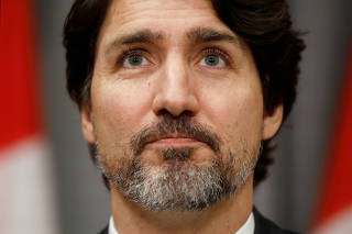 Canada's Prime Minister Justin Trudeau pauses during a news conference on Parliament Hill in Ottawa