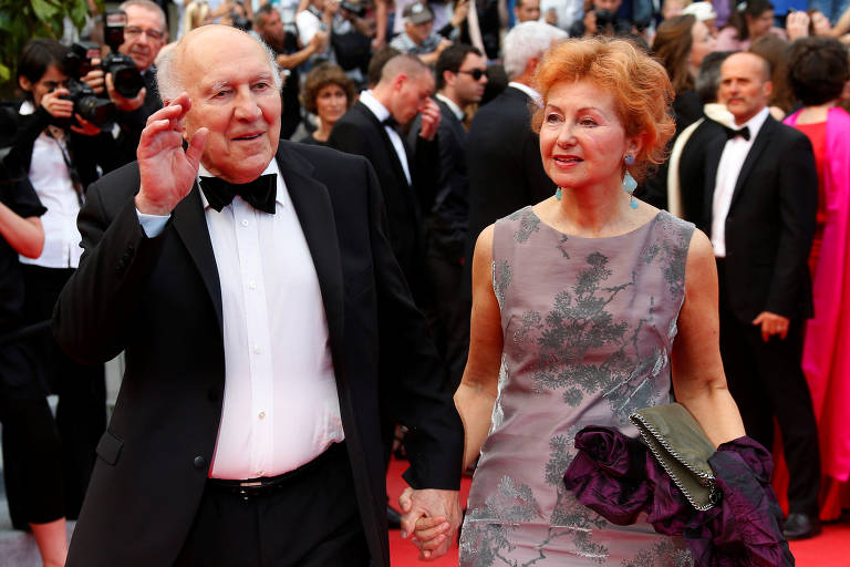 Ator Michel Piccoli ao lado de sua mulher, Ludivine Clerc, no tapete vermelho da 67ª edição do Festival de Cannes, em 2014 