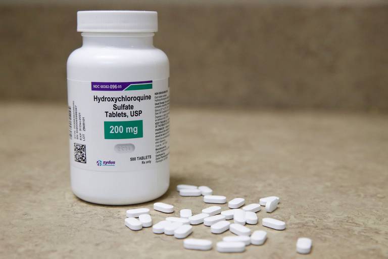 Frasco e pílulas do medicamento hidroxicloroquina