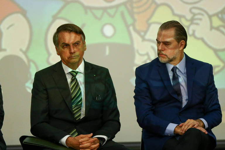 O presidente Jair Bolsonaro acompanhado do presidente do STF, ministro Dias Toffoli, durante seminário sobre combate a corrupção