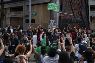 A gathering on Wednesday, June 10, 2020, in the Seattle neighborhood of Capitol Hill, where protesters have established an ?autonomous zone.? (Ruth Fremson/The New York Times)