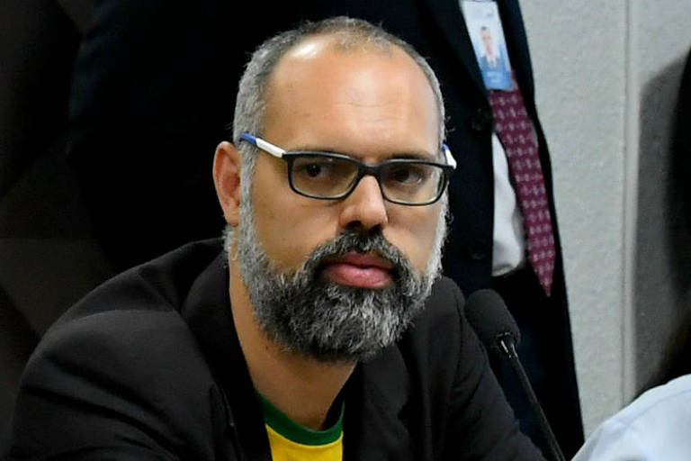 O influenciador bolsonarista Allan dos Santos em depoimento à CPI das Fake News 