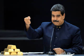FILE PHOTO: Venezuela's President Maduro speaks during a meeting with the ministers responsible for the economic sector in Caracas
