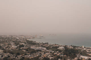 Dust coming from the Sahara desert floats over the city of Bridgetown