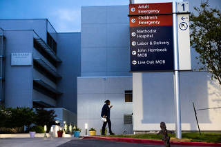 A health care worker arrives at Methodist Hospital in San Antonio, June 28, 2020. (Christopher Lee/The New York Times)