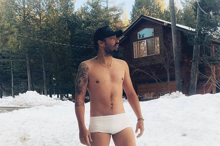 Após término com Maiara, Fernando Zor posa de sunga branca na neve