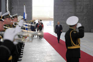 Russian President Vladimir Putin attends a ceremony in Kerch