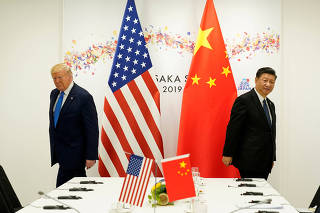 FILE PHOTO: U.S. President Donald Trump attends a bilateral meeting with China's President Xi Jinping during the 2019 G20 leaders summit in Osaka, Japan