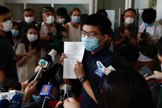 FILE PHOTO: Pro-democracy activist Joshua Wong registers as a candidate for the upcoming Legislative Council election in Hong Kong